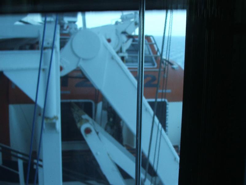 DSCF9529.JPG - Taking the elevator past the lifeboats (used as tenders, too).