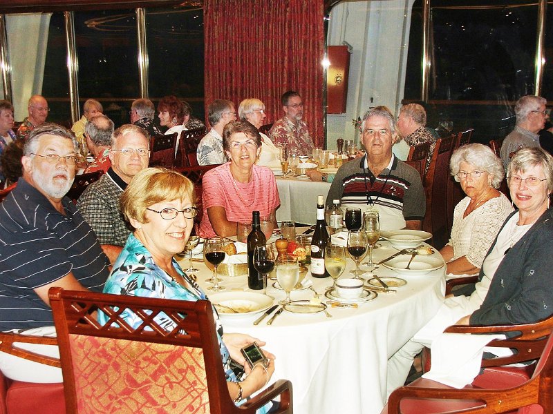 DSCF1818B.JPG - Our dinner table.  Marian in front, then clockwise: John, Eric, , Tony, Sally, Debbie
